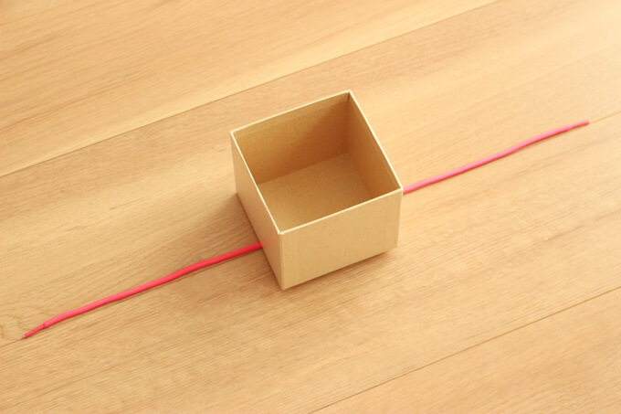 引っ張るおもちゃを手作りしよう ひもが無限にひっぱれて好奇心をくすぐります オウチーク